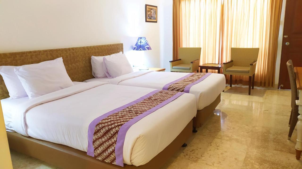 Hotel Puri Lovina Extérieur photo
